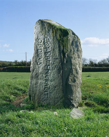 This early medieval inscribed stone from Penbryn, Ceredigion, commemorates CORBALENGI IACIT ORDOVS (of Corbalengus, he lies, an Ordovician). Crown Copyright ©RCAHMW (NPRN304135, D12005_1198)
